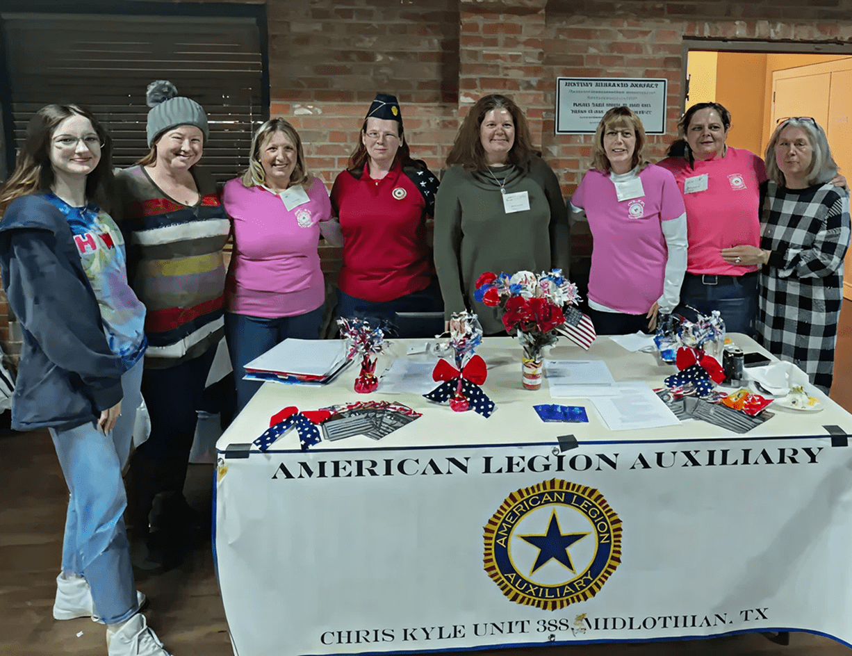 Group at American Legion Auxiliary table.