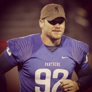 Chris Kyle in Midlothian Panthers football jersey
